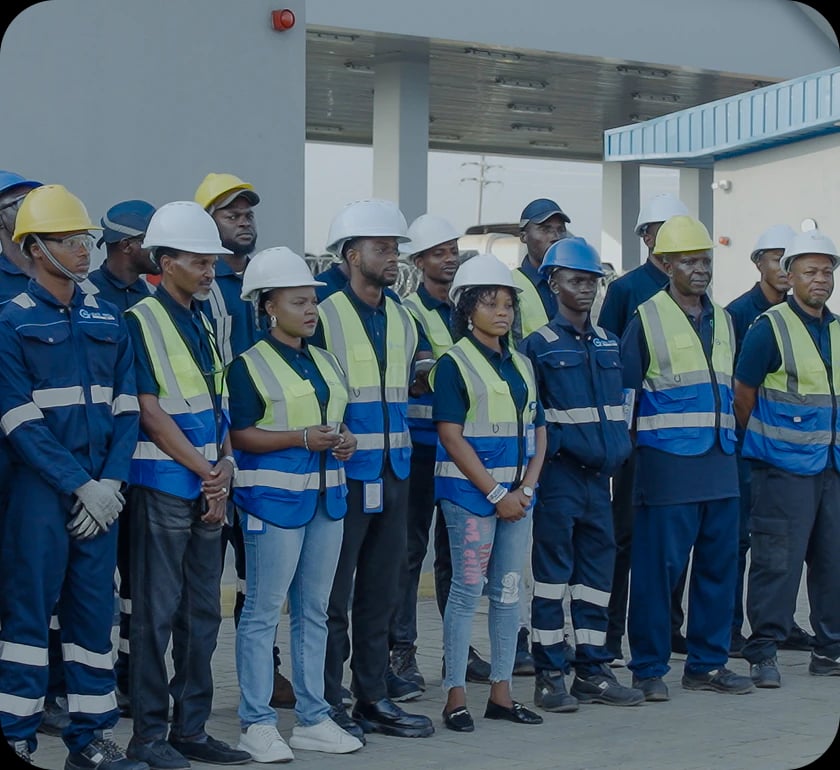 Gas Tech crew in hard hats and hi-vis vests at the mother station