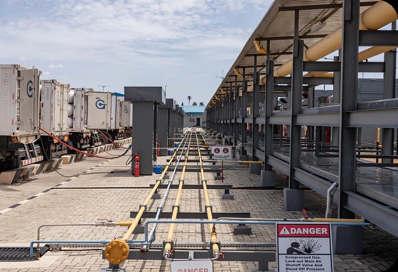 Gas lines running from the compression gantry to the CNG trailer bays