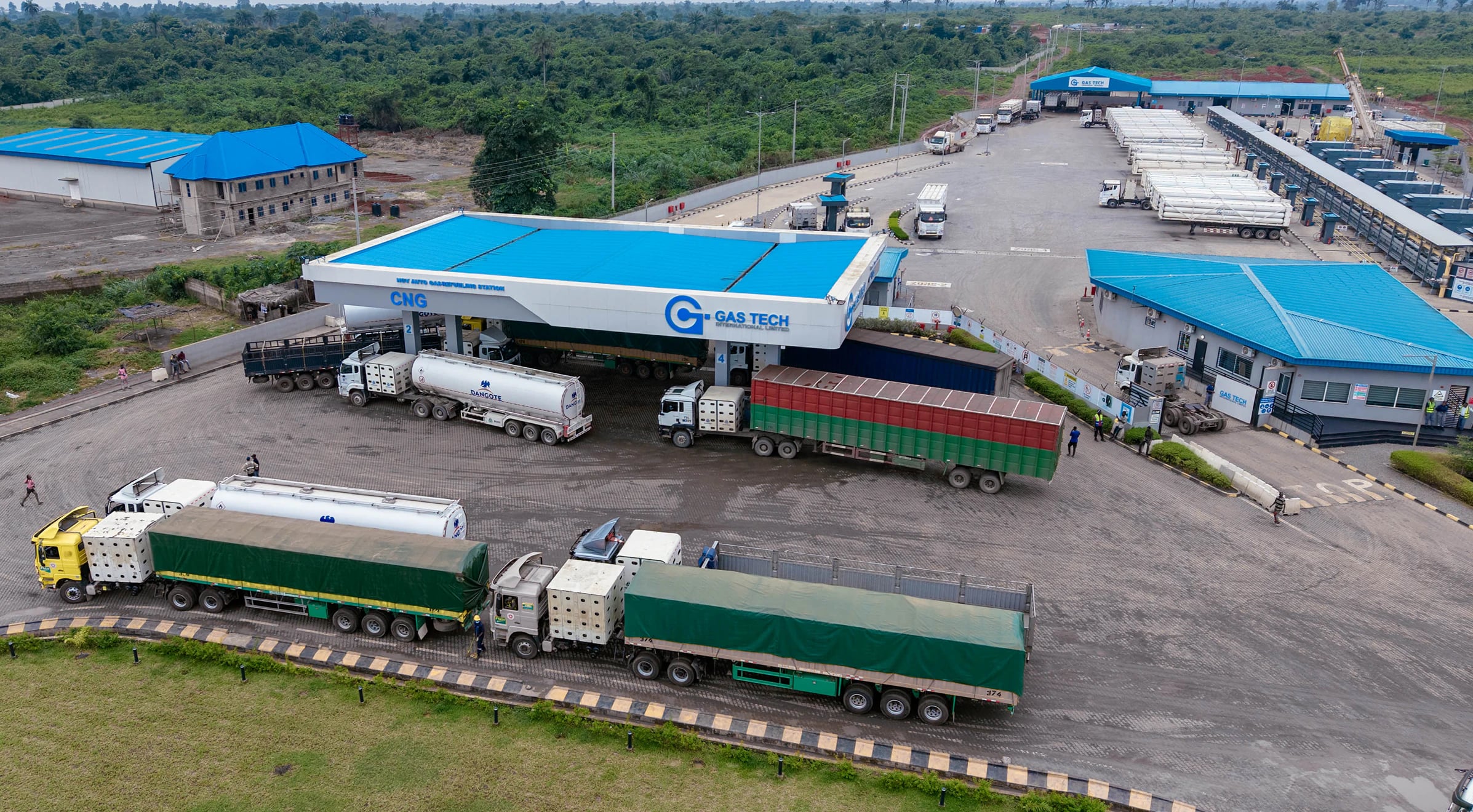 Aerial view of CNG trucks queued at the Gas Tech compression station on the Sagamu–Benin Expressway