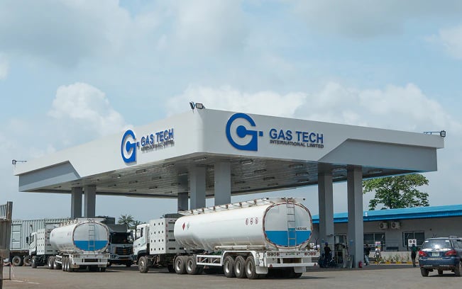 Tankers refuelling under a Gas Tech canopy